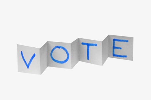 VOTE word written on paper