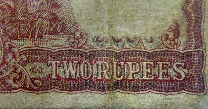 Two rupee written in English language on Two rupee banknote