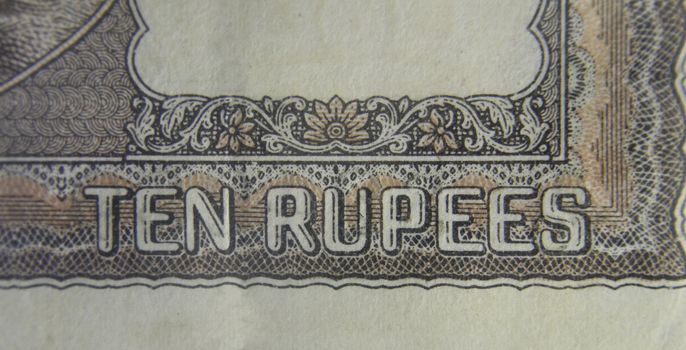 Ten rupee written in English language on Ten rupee banknote