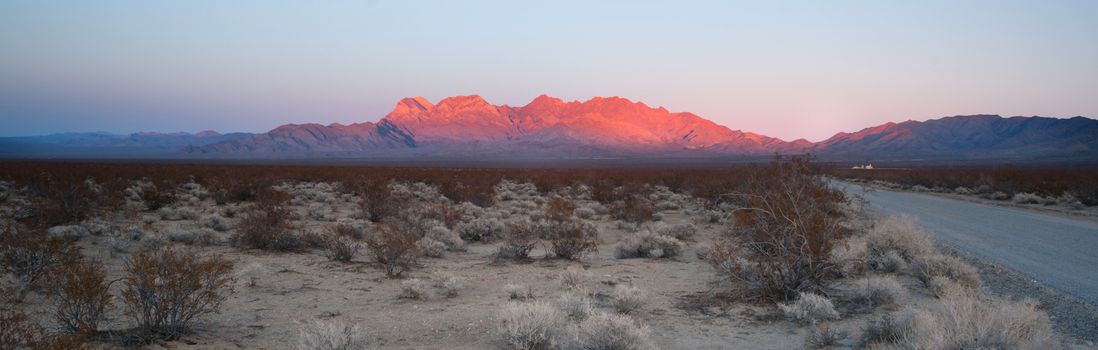 The last of the light hits the mountains in the Mojave Desert