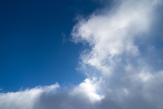 White clouds in blue sky.