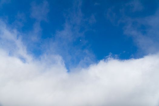 White clouds in blue sky.