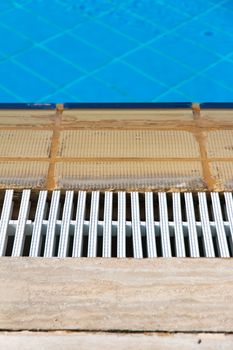Side of swimming pool.