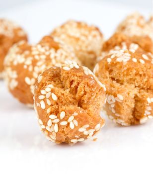 crispy donut ball with white sesame on white background