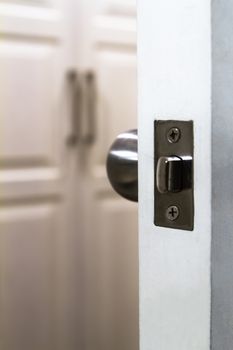 Detail of white opened door.