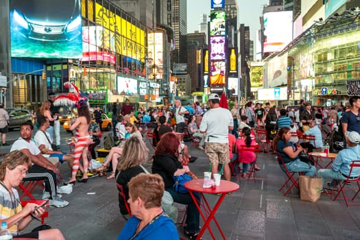 New York – Sept 2014: A man carrying a slogan which states “Repent! Follow Jesus!” for the thousands of tourists roaming the streets of Times Square on Sept 7, 2014 in New York, USA.