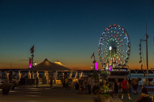 Maryland, Aug 28: People enjoy a beautiful summer evening at the National Harbour in Maryland, USA -  August 28, 2014.