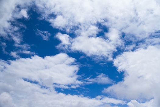 White clouds in blue sky.
