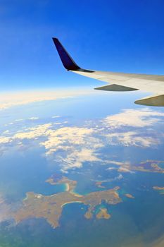view from the airplane window over the ocean