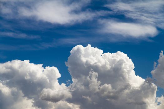 White clouds in blue sky.