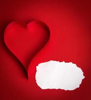 valentine's paper hearts on a red background , valentine's day , day valentine postcard with space for text