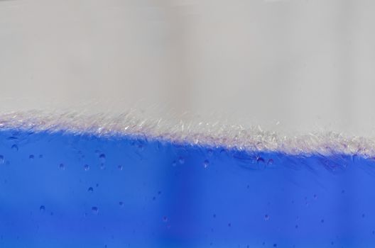 Close up of a blue liquid, water, background image.