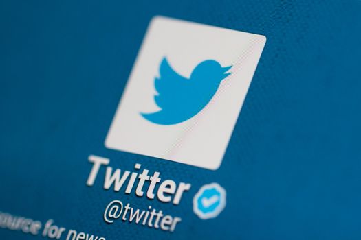 ISTANBUL, TURKEY - MARCH 22, 2013: Photo of Twitter account with user and profile name on tablet.  Twitter is one of the most used social networking and microblogging web site.