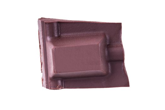 Top view of broken dark milk chocolate bar piece, isolated on white background.