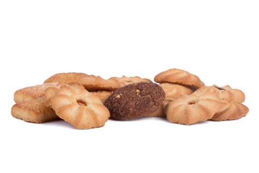 Heap of biscuit cookie chips, isolated on white background.
