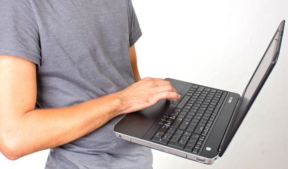 laptop with white screen on wooden background