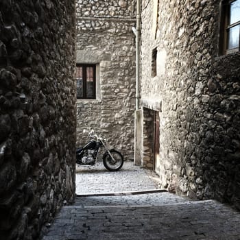 Stone buildings in medieval town of Baga. Catalonia, Spain.