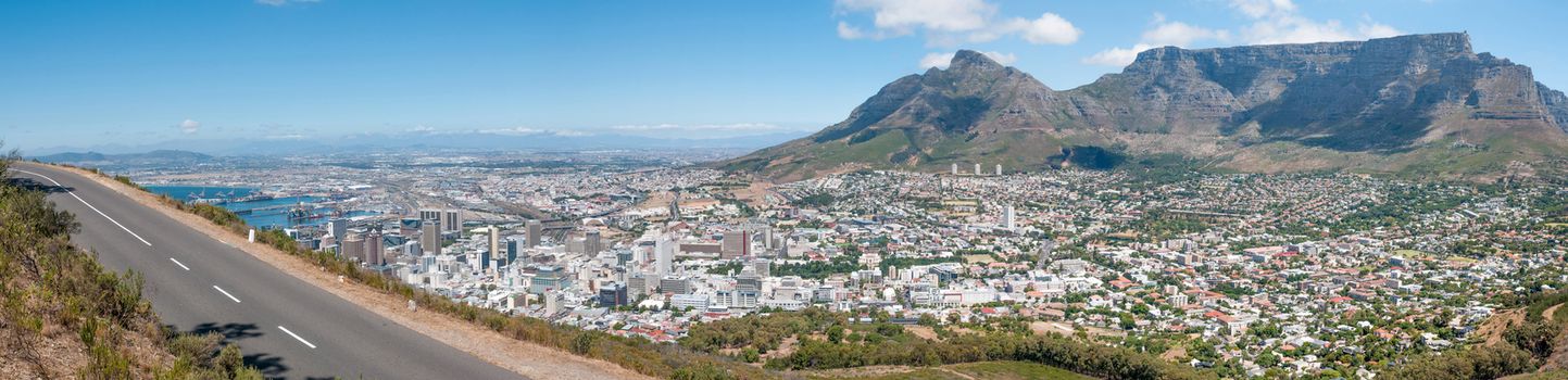 CAPE TOWN, SOUTH AFRICA - DECEMBER 18TH, 2014: Panorama of Table Mountain, Devils Peak, harbor and the city center as seen from Signal Hill.
