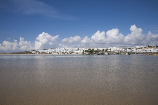 landscape from water of white houses Conil de la Frontera village Andalusia Spain Europe