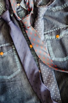 Detail of denim vintage shirt with three ties