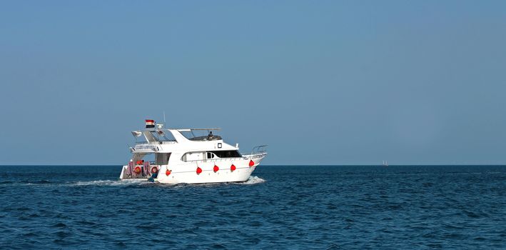 White Ship Moving By The Red Sea