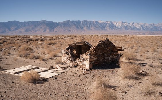 An abandoned dwelling on the desert valley floor