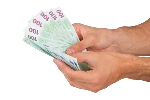 Male hand holding one hundred euro money banknotes, isolated on white background.