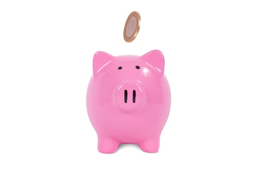 Saving finance concept, coins and pink piggy bank, isolated on white background.