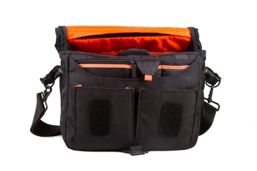 Front view of open camera bag, isolated on white background.