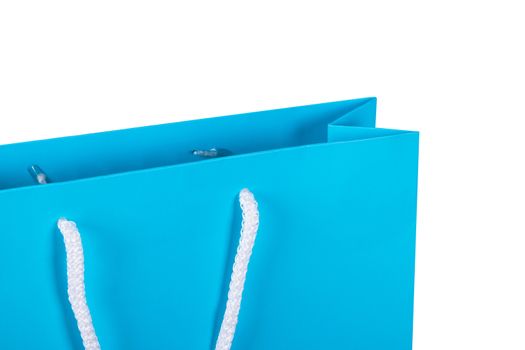 Close up view of blue carton shopping bag, isolated on white background.
