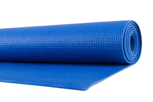 Close up view of blue open yoga or pilates mat for exercise, isolated on white background.