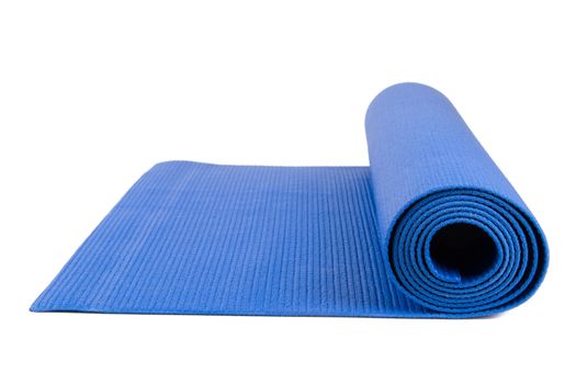 Close up view of blue open yoga mat for exercise, isolated on white background.