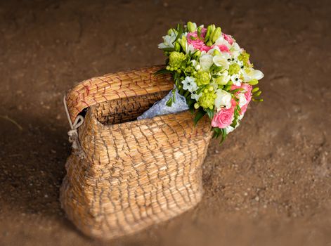 Beautiful bridal bouquet in basket