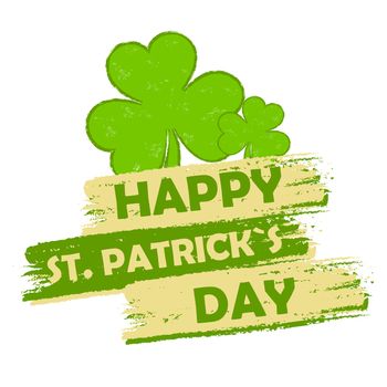 happy St. Patrick's day - text in green drawn banner with three leaved shamrock symbols, holiday seasonal concept