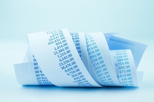 accounting concept with billing paper roll in blue tone