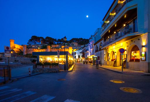 Spain, Catalonia, Tossa de Mar 22.06.2013, promenade street Passeige del Mar, summer night,  Editorial use only. ISO 500, possible slight noise