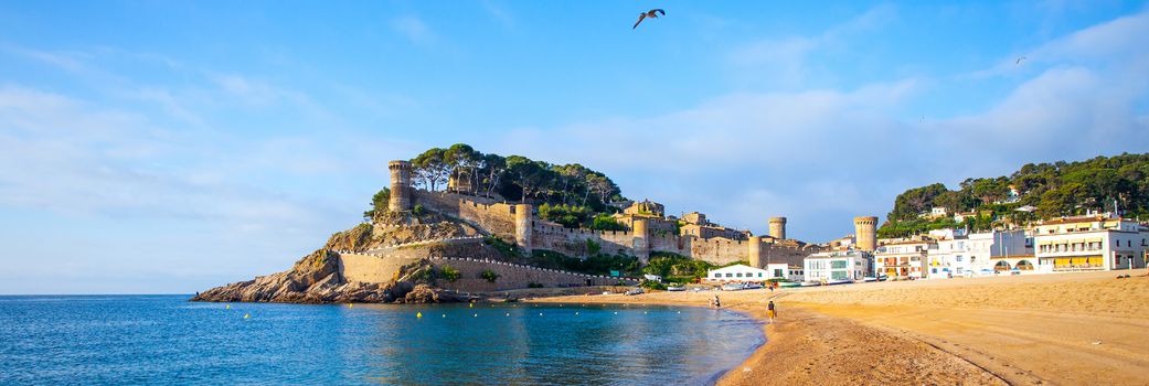 Tossa de Mar, Catalonia, Spain, JUNY 13, 2013, the panorama overlooking the bay Badia de Tossa and medieval fortress Vila Vella on a rock. Editorial use only