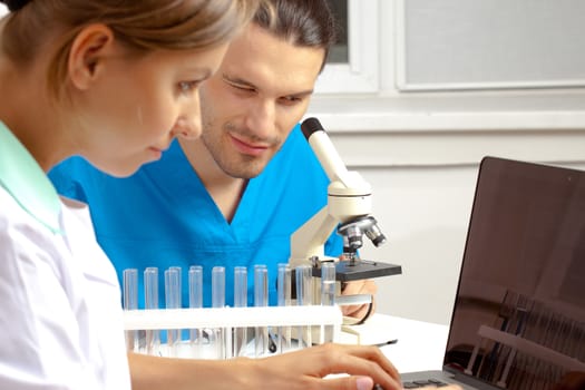 group of scientists working at the laboratory