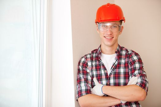 Portrait of happy young male construction worker