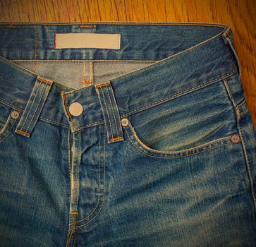 indigo jeans with a button, close-up photo, instagram image style