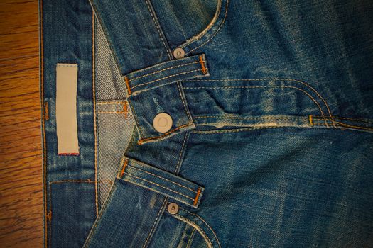 indigo jeans with a button, close-up photo, instagram image style