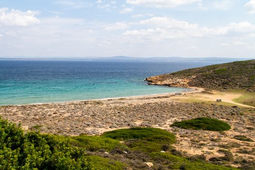 View of sea coast and cloudy sky.