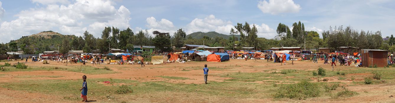 KEY AFER, ETHIOPIA - NOVEMBER 20, 2014: People on the weekly market in Key Afer on November 20, 2014 in Key Afer, Ethiopia, Africa.