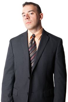 Serious business man in a black suit isolated over a white background.