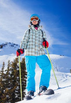 Ski, skier, winter - lovely girl has a fun on ski