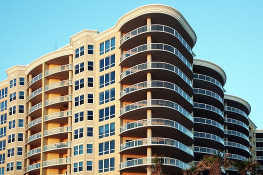 Beautiful condos with balconies overlooking the beach.