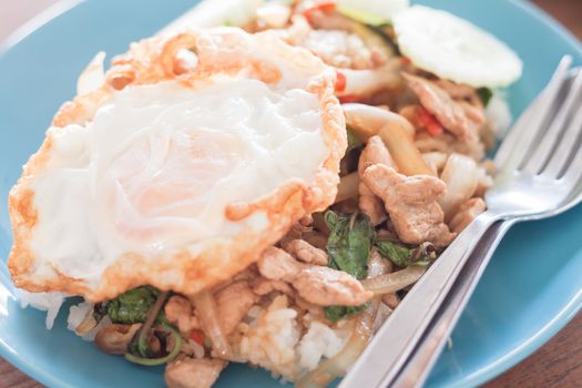 Basil fried rice with pork and fried egg, stock photo