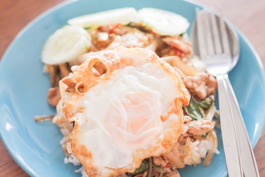 Basil fried rice with pork and fried egg, stock photo