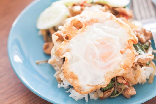 Basil fried rice with pork and fried egg, stock photo