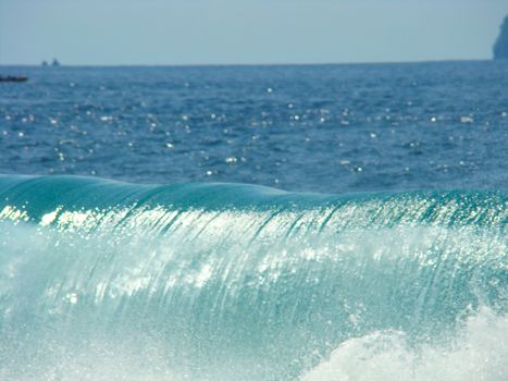 Large aquamarine coastal wave
